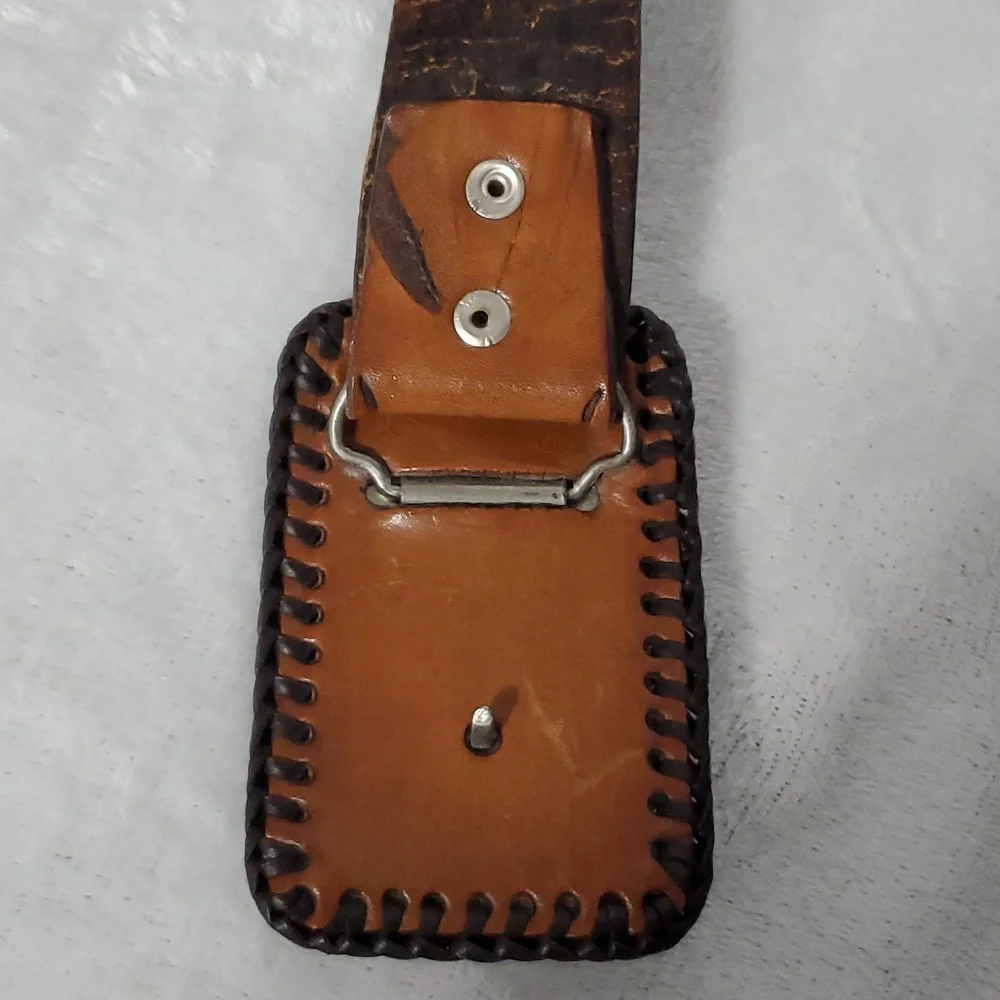Vintage Leather Belt With Eagle Buckle and Details Embossed Along the Strap.